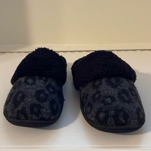 Black and gray woman’s slippers